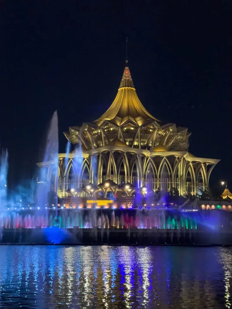 Kuching waterfront at night with fountain show